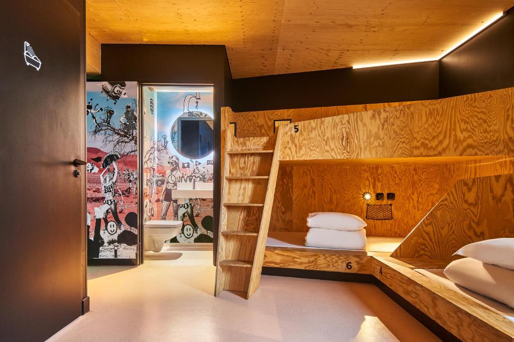 Painted corridor walls and bunk fittings inside a modern hostel building