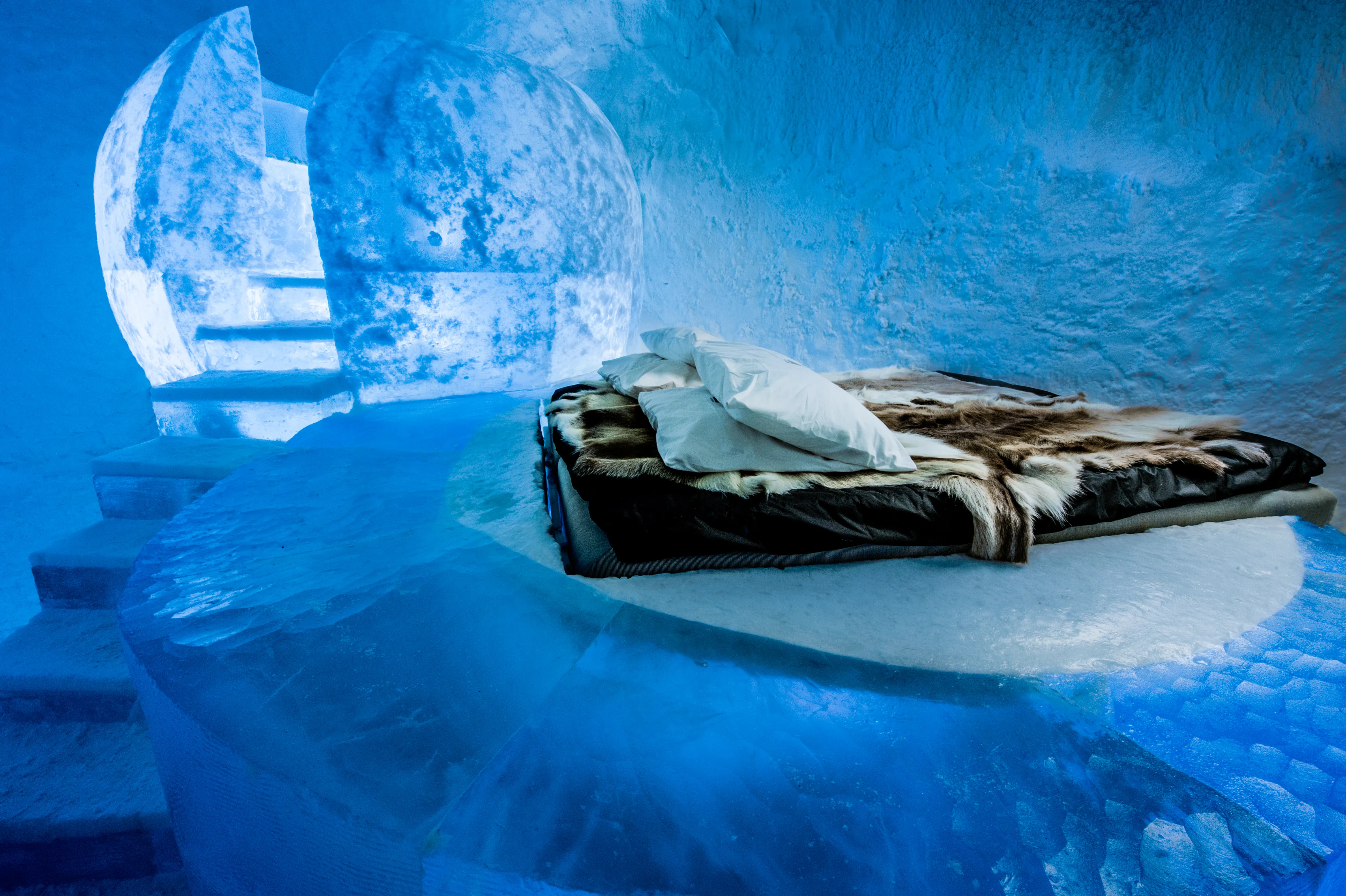 A snow structure at blue hour on a frozen northern shore