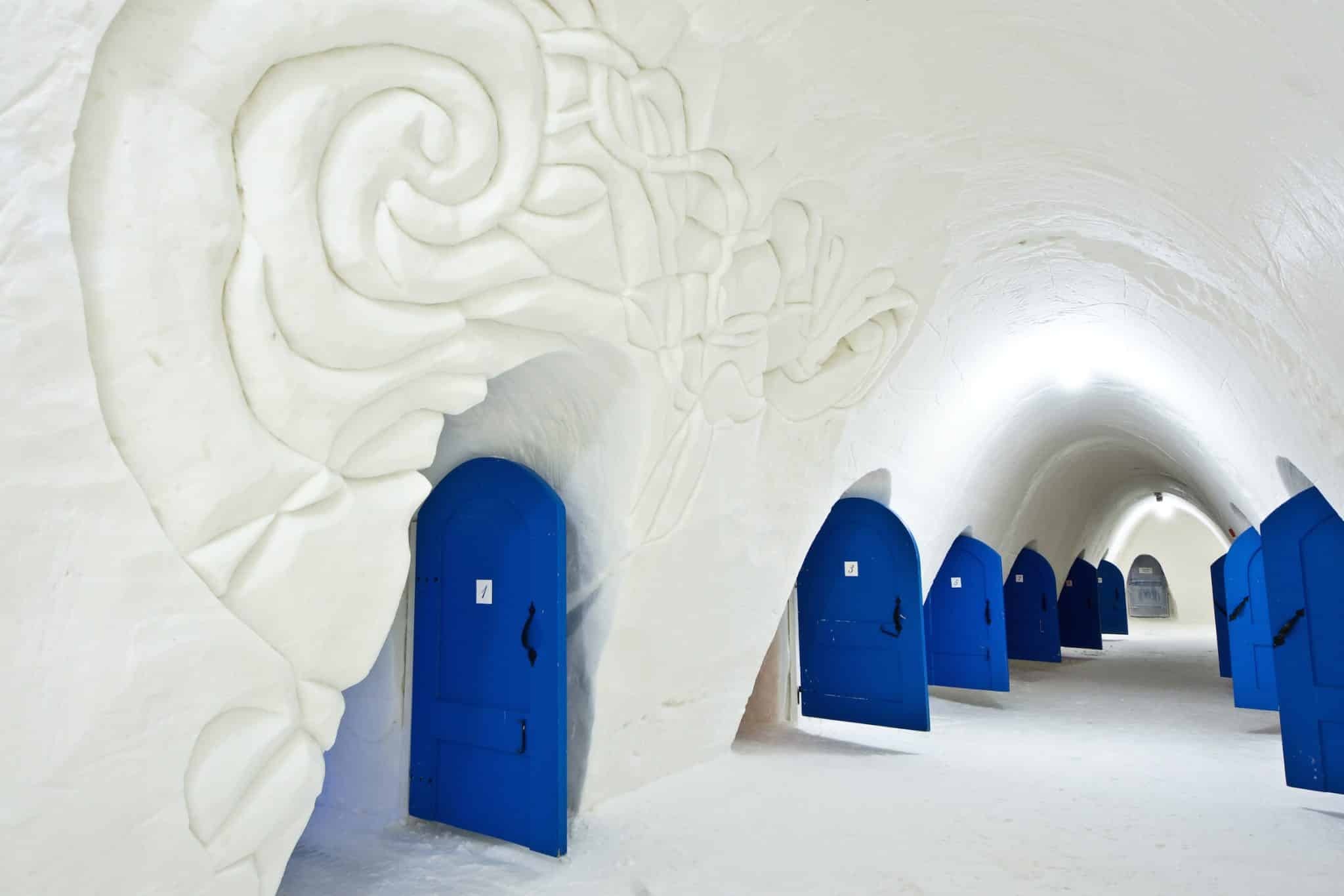Packed snow vaults and carved ice seating beside the Bay of Bothnia